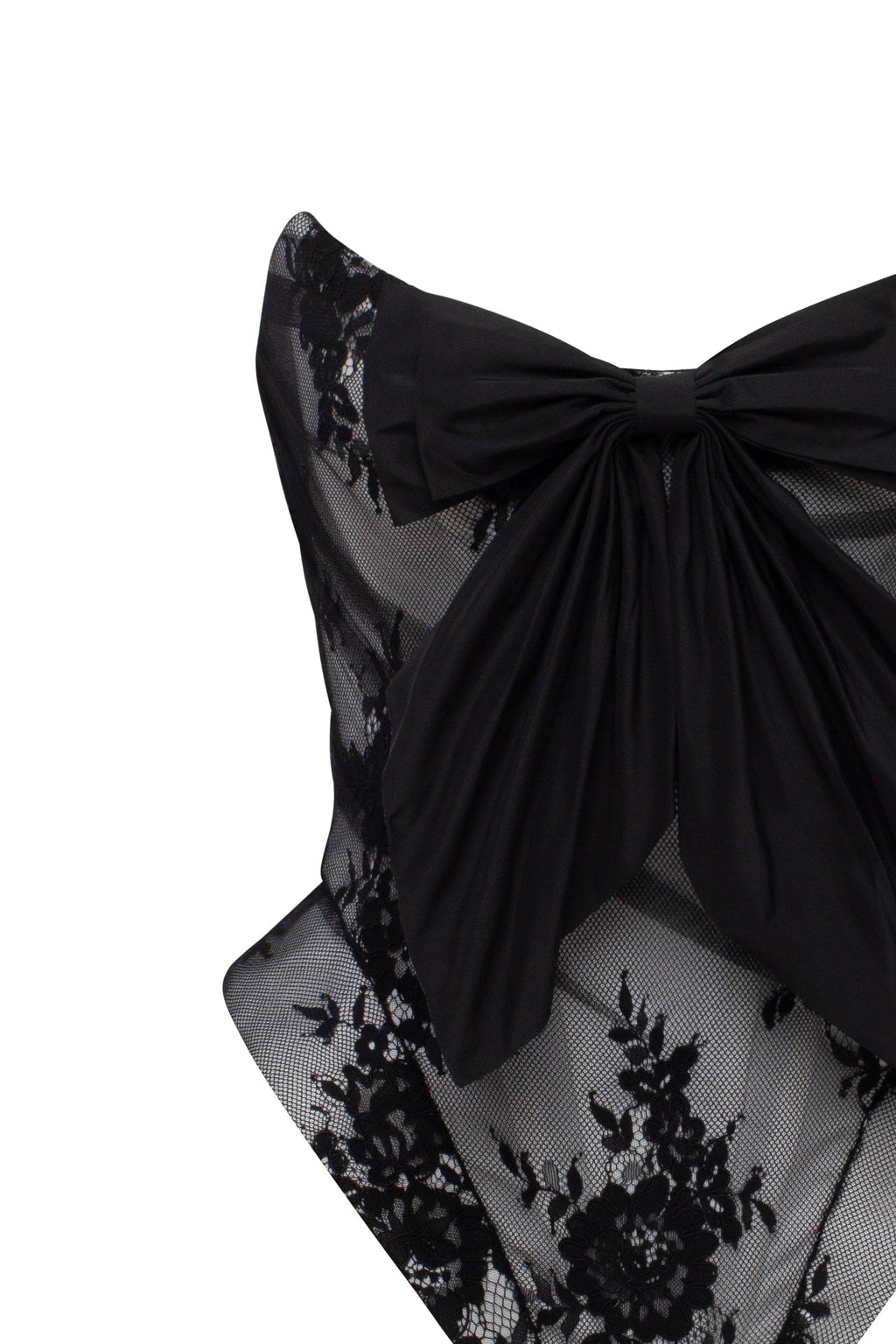 Black lace over the white mesh peplum corset with an oversized bow Parisienne