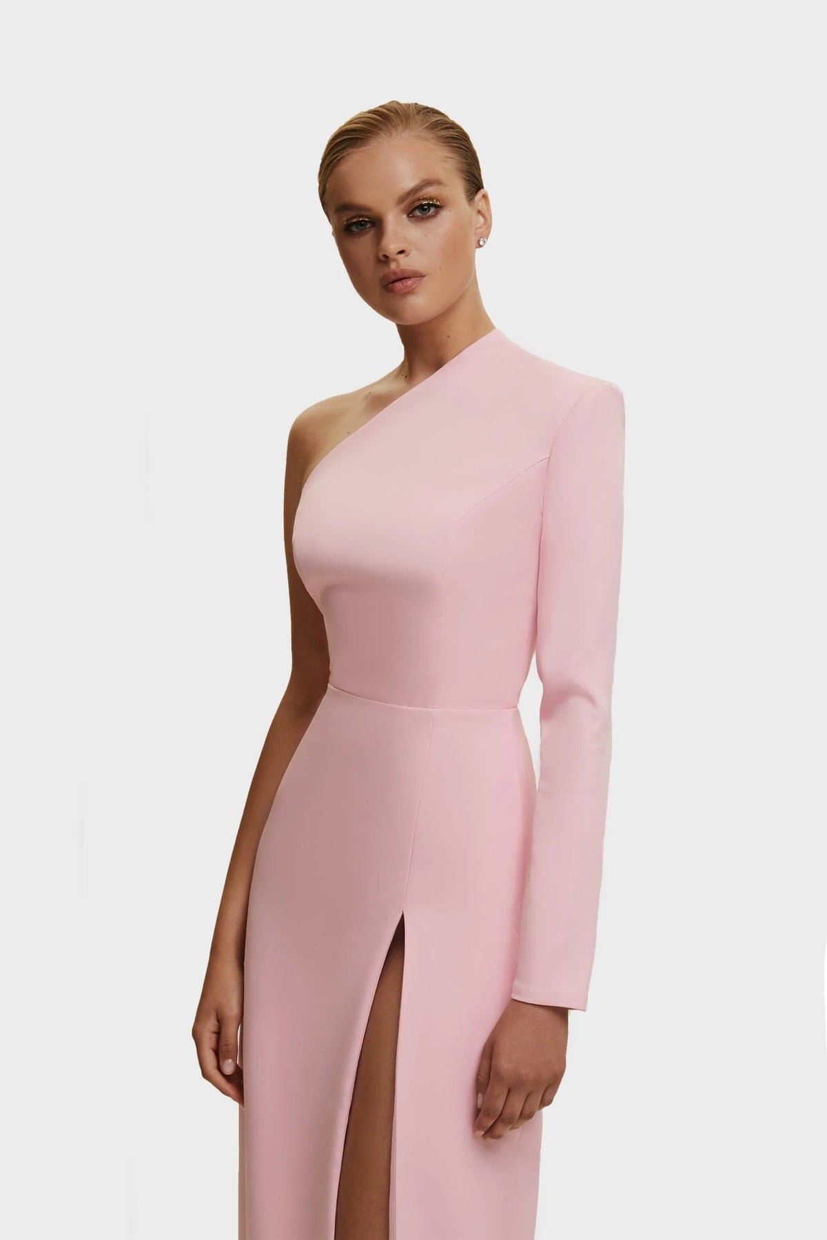 Pink Long sleeved dress with sharp shoulder cut