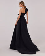 Black taffeta evening gown with a high slit and one shoulder wrap top
