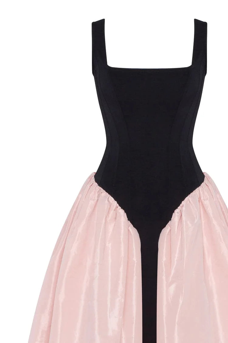Black corset dress on straps with a glossy pink midi skirt