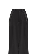 Refined black pants cut from Italian satin Xo Xo