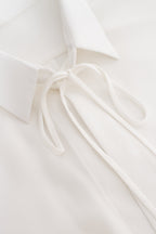 Ruffled blouse in white Xo Xo