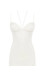 White cocktail dress decorated with feathers Xo Xo
