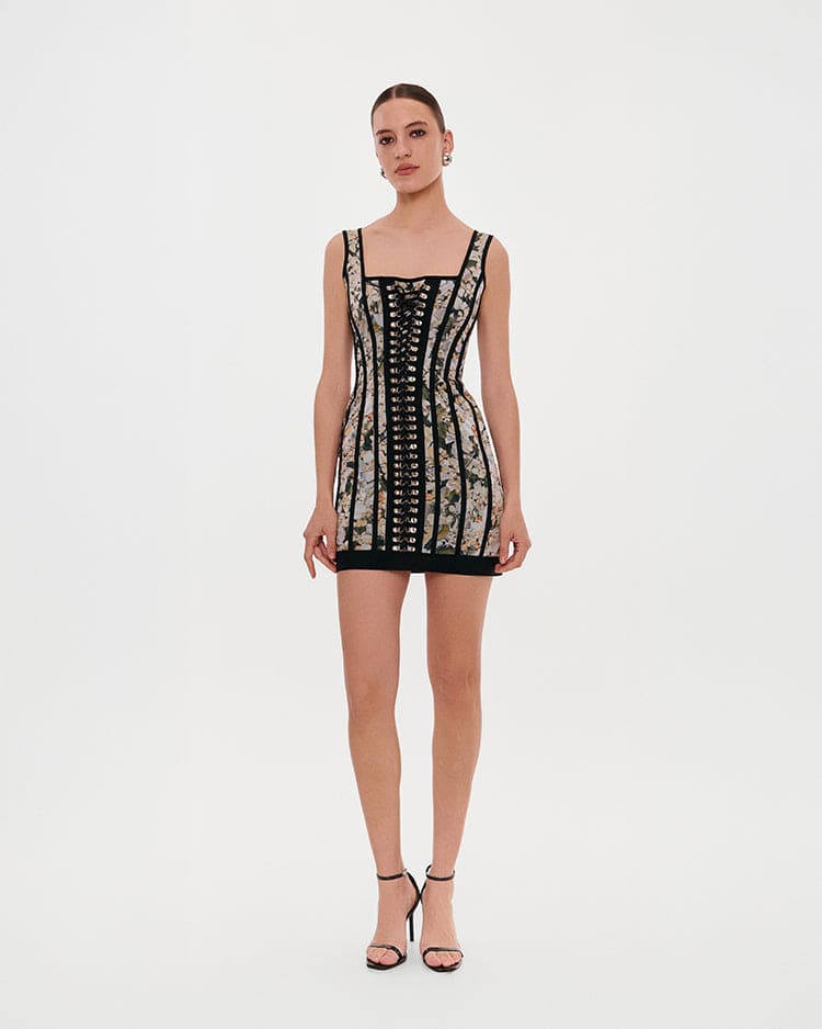 Alluring floral mini dress with bold lace up hook closure