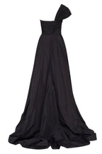 Black taffeta evening gown with a high slit and one shoulder wrap top