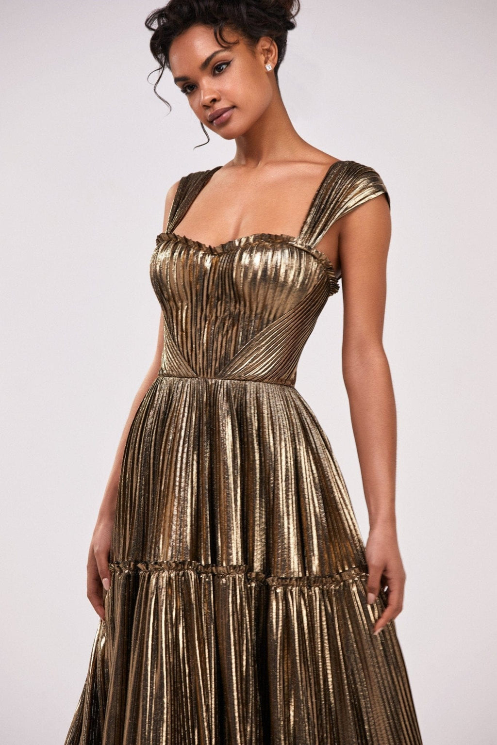 Golden Shiny maxi evening dress with an off the shoulder neckline