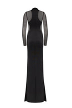 Showstopper black dress with semi transparent inserts