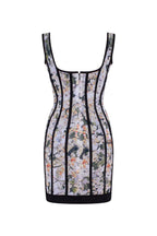 Alluring floral mini dress with bold lace up hook closure