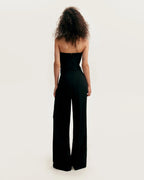 Refined black pants cut from Italian satin Xo Xo