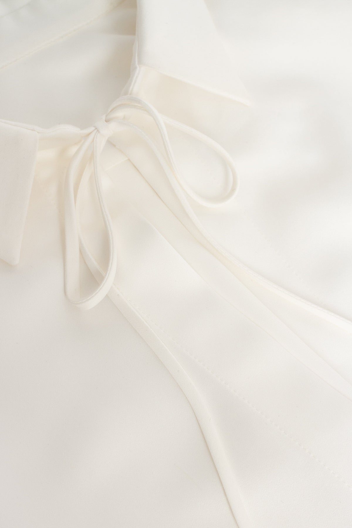 Front tie satin blouse in white Xo Xo