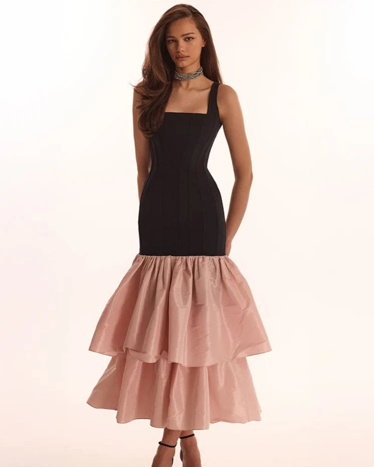 Black fitted maxi dress with pink puffy tiered skirt Parisienne