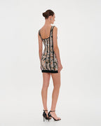 Alluring floral mini dress with bold lace up hook closure