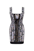 Alluring floral mini dress with bold lace up hook closure