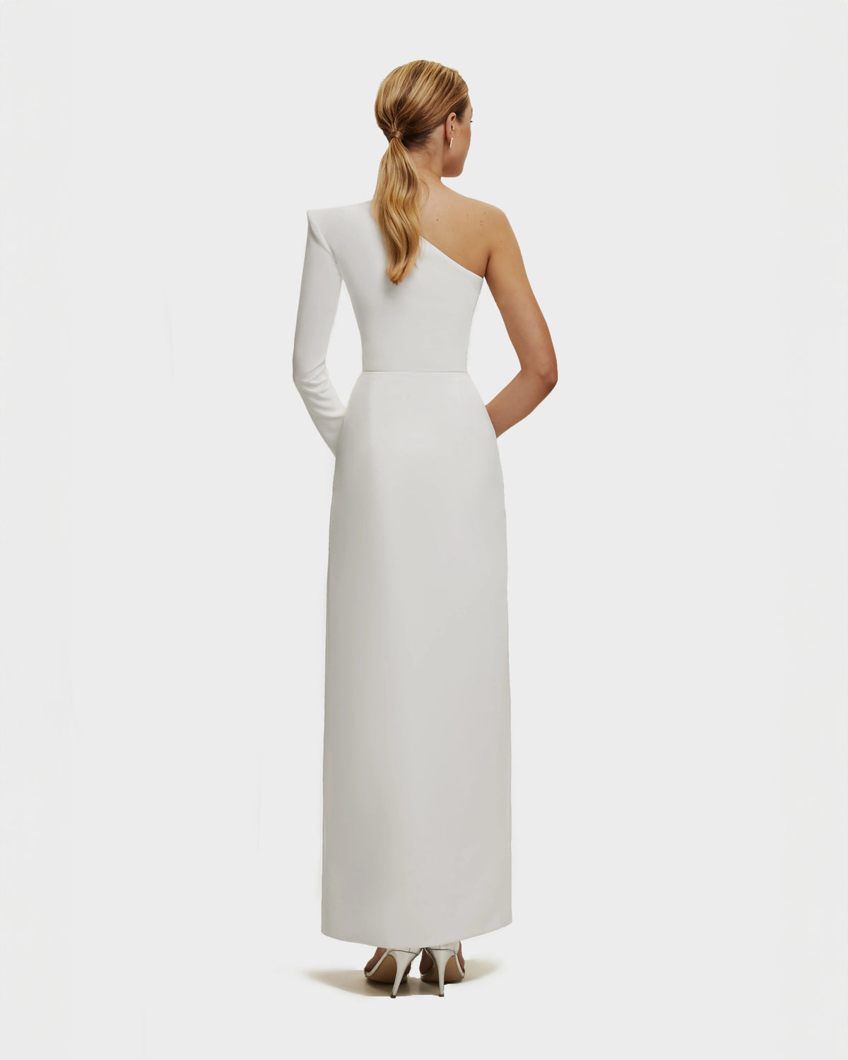 White Long sleeved dress with sharp shoulder cut