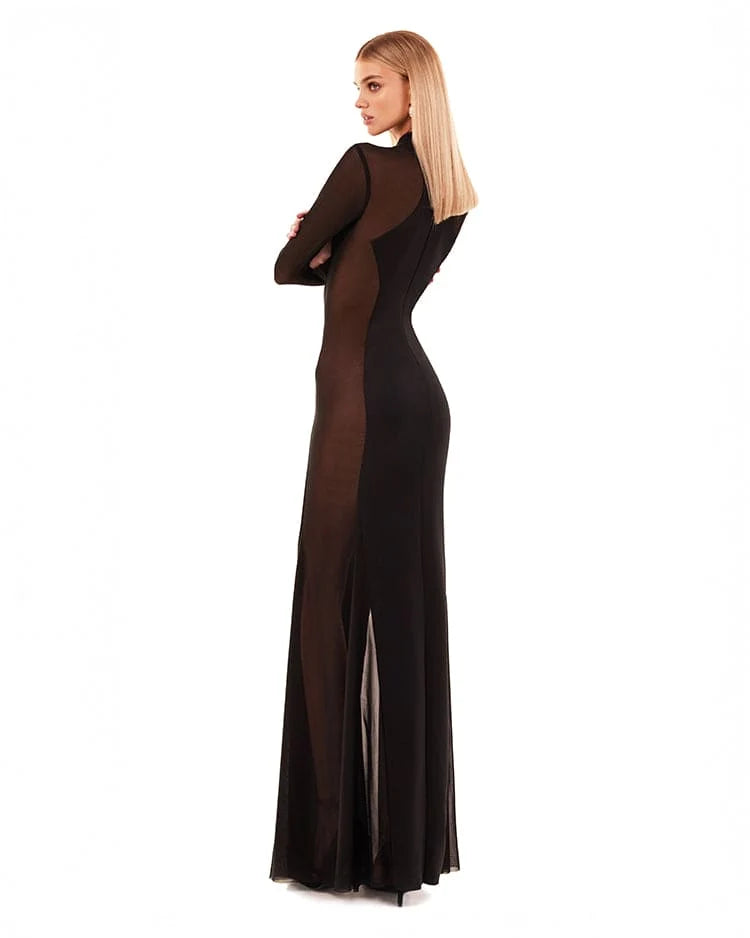 Showstopper black dress with semi transparent inserts
