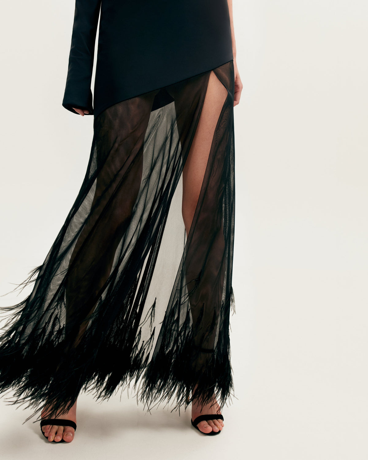 One shoulder maxi dress with feather trimmed bottom Xo Xo