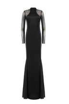 Showstopper black dress with semi transparent inserts