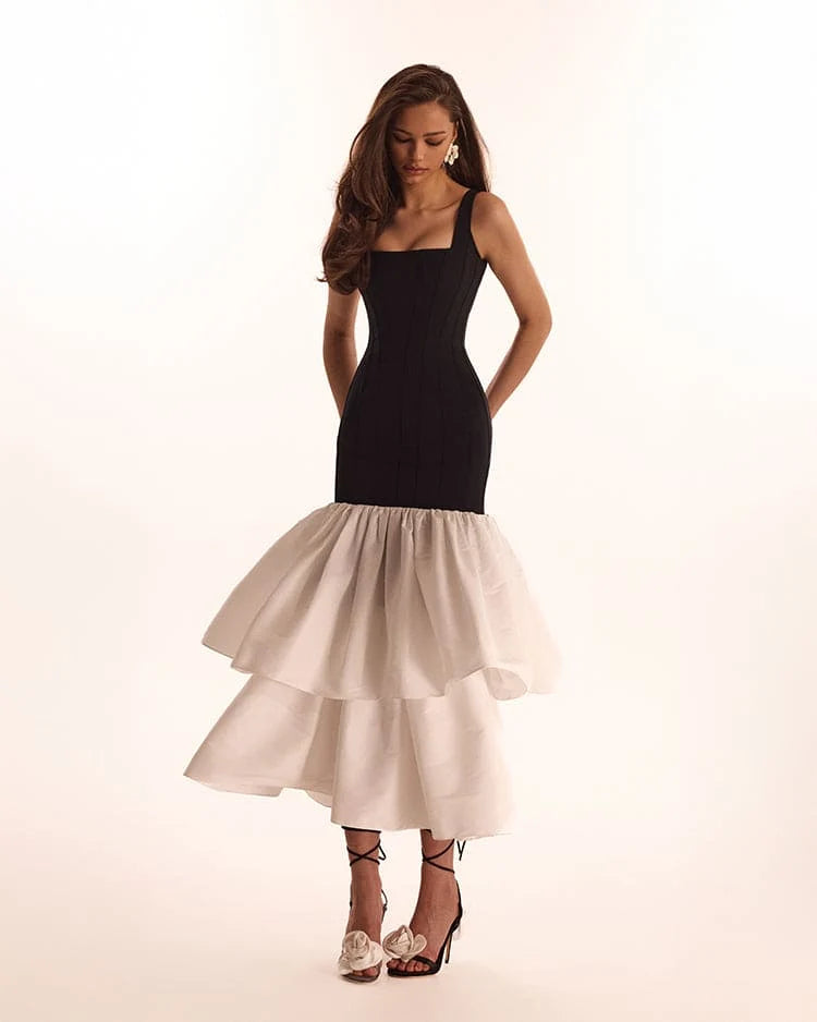 Black fitted maxi dress with white puffy tiered skirt Parisienne