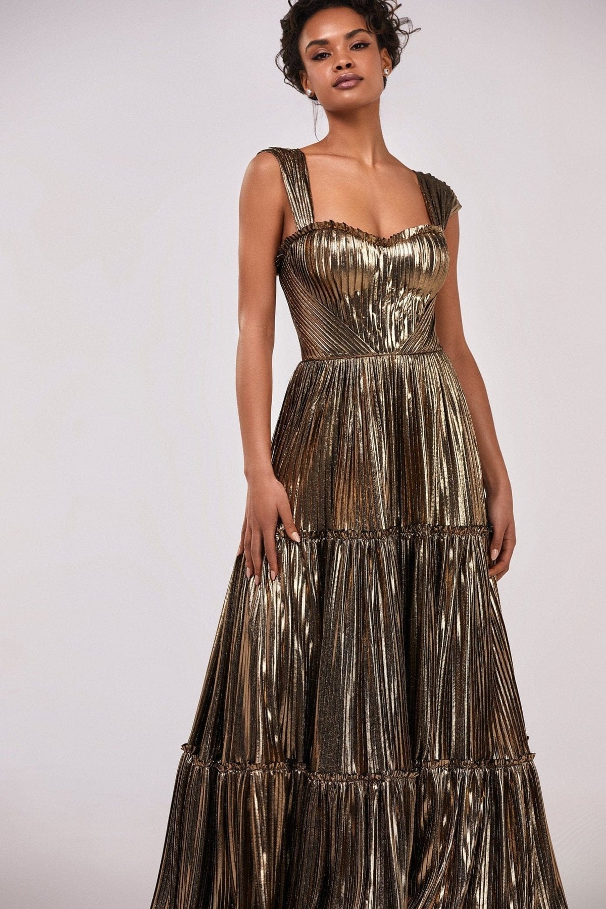 Golden Shiny maxi evening dress with an off the shoulder neckline