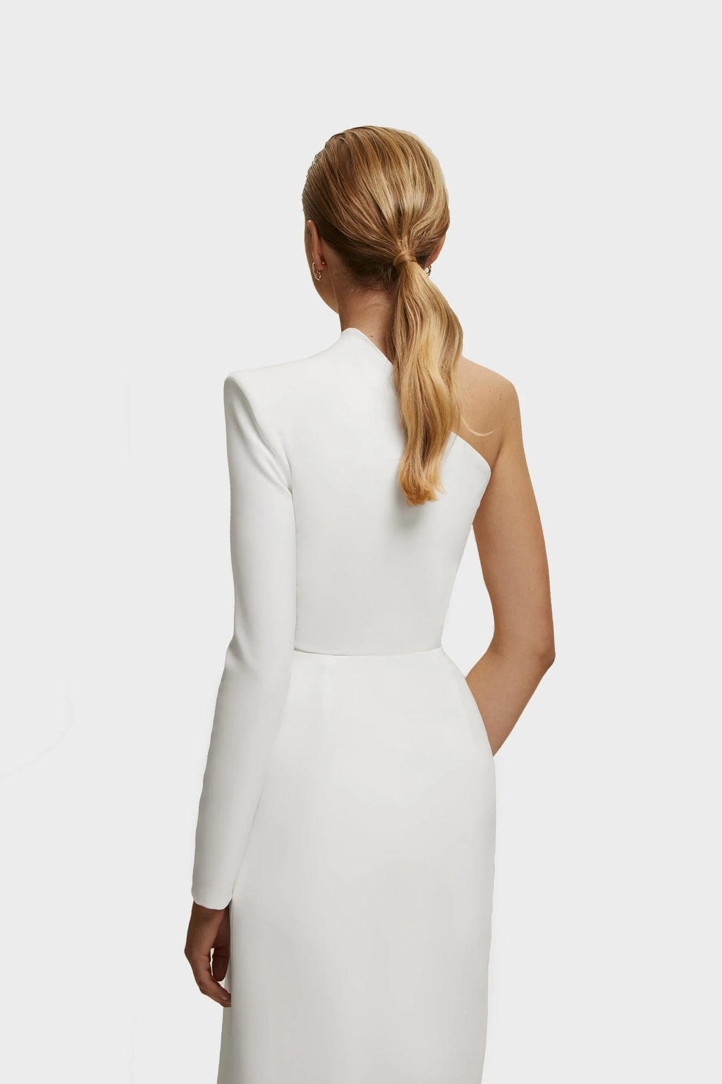 White Long sleeved dress with sharp shoulder cut