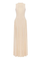 Nude sleeveless mock neck dress with a pleated maxi skirt