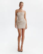 Sparkling beige mini dress with draping