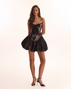 Black lace over the white mesh peplum corset with an oversized bow Parisienne